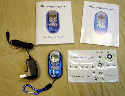 The phone (with translucent blue shell), a charger, a backpack clip, 
